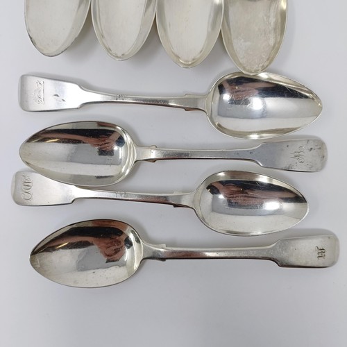 153 - A matched set of silver fiddle pattern dessert spoons, various dates and marks, 10 ozt (8)