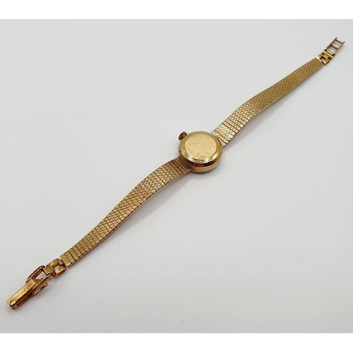 694 - A ladies 9ct gold Zenith wristwatch