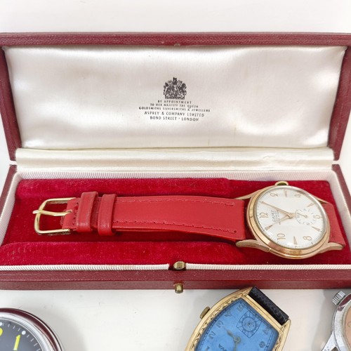 699 - A gentleman's early 20th century wristwatch, a Camy wristwatch, cased, and assorted other watches