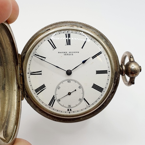 697 - A silver hunter pocket watch