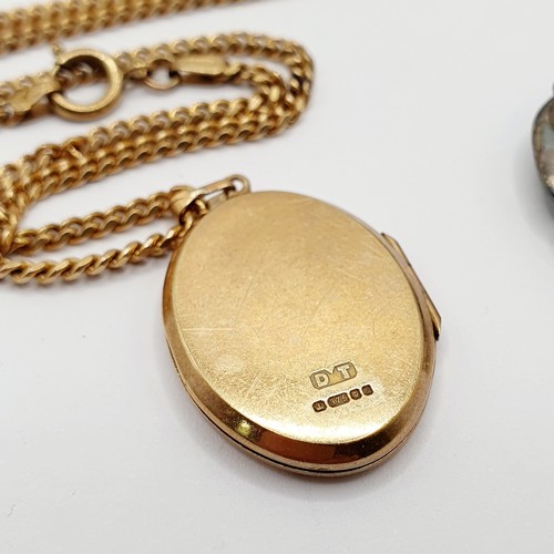 110A - A 9ct gold locket, on a 9ct gold chain, all in 20 g, a silver crown, 1892, a silver cased inkwell, a... 