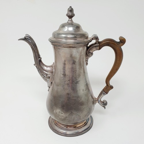 112B - A George III silver coffee pot, with a wooden handle, marks rubbed, all in 23.4 ozt