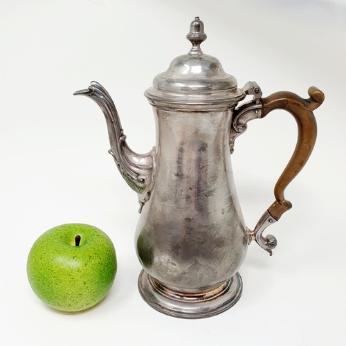 112B - A George III silver coffee pot, with a wooden handle, marks rubbed, all in 23.4 ozt