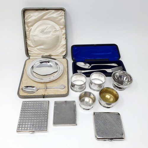 124A - A Continental silver coloured metal compact, a George V silver bowl and matching spoon, paste, three... 