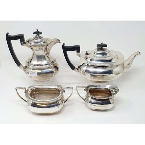 125A - A George V silver four piece tea service, with ebonised handles, Sheffield 1931, all in 51 ozt (4)