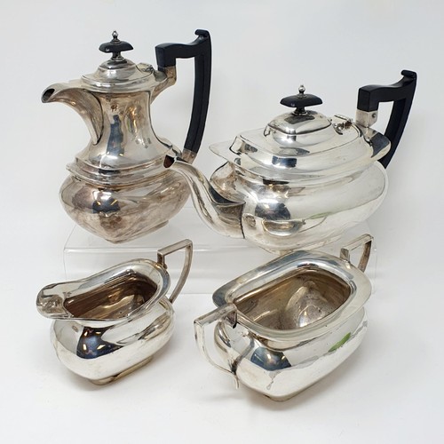 125A - A George V silver four piece tea service, with ebonised handles, Sheffield 1931, all in 51 ozt (4)