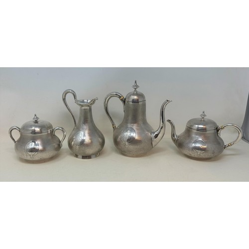 200A - A Continental silver four piece tea service, with a coffee pot, teapot, and a sugar bowl and cover, ... 