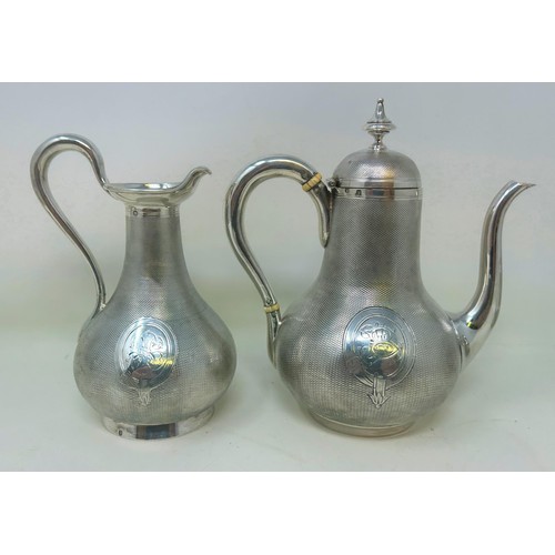 200A - A Continental silver four piece tea service, with a coffee pot, teapot, and a sugar bowl and cover, ... 