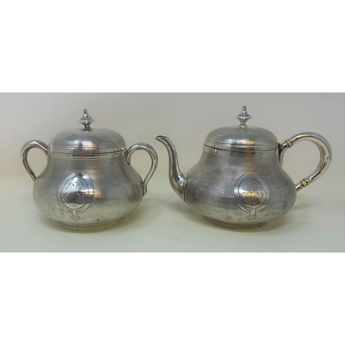 200A - A Continental silver four piece tea service, with a coffee pot, teapot, and a sugar bowl and cover, ... 