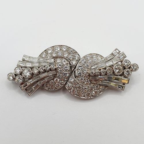 823 - An Art Deco diamond double clip brooch, stamped DS & Co