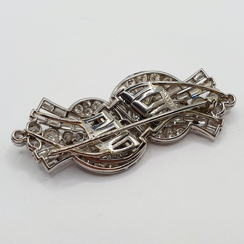 823 - An Art Deco diamond double clip brooch, stamped DS & Co