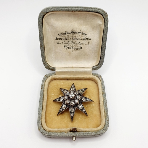 888 - A late 19th/early 20th century diamond star brooch