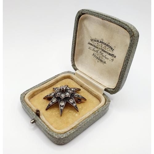 888 - A late 19th/early 20th century diamond star brooch