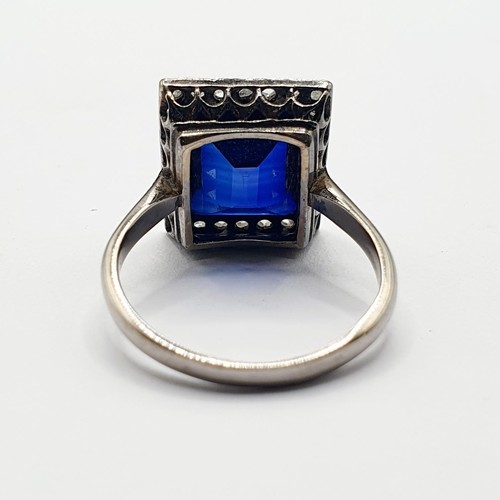 912 - An early 20th century platinum, sapphire and diamond ring, ring size N