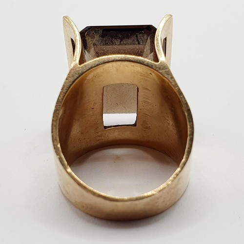 838 - A 1970s 9ct gold and brown stone dress ring, ring size Q