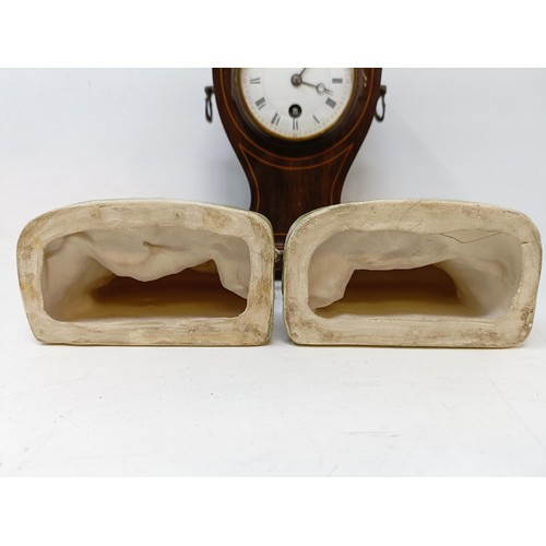 342 - An Edwardian inlaid mahogany mantel clock, a pair of dog bookends, damaged, a wall light and other i... 