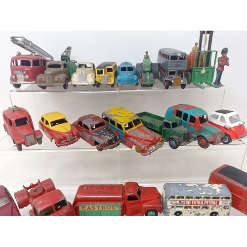 406 - A Dinky Toys Castrol Petrol truck, assorted Dinky playworn toys, and other items (box)