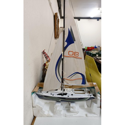 415 - A model boat, 74 cm wide, four other model boats, and model boat parts (qty)