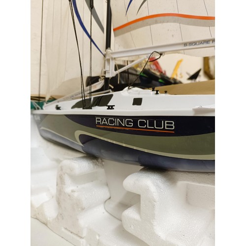 415 - A model boat, 74 cm wide, four other model boats, and model boat parts (qty)