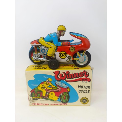 425 - An Indian Winner 83 tinplate motorcycle, boxed, other tinplate and toys, mostly boxed (box)