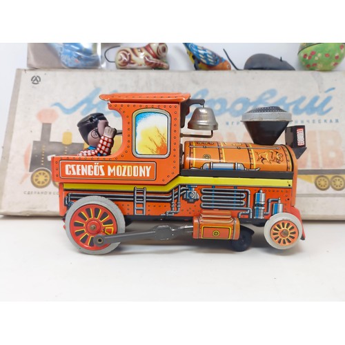 427 - A Russian tinplate toy train, other tinplate and toys (box)