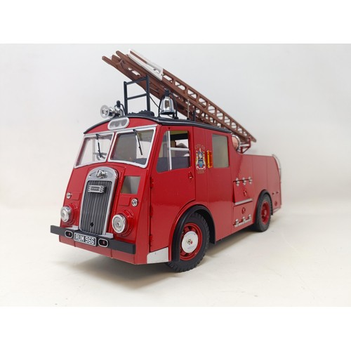 430 - A Corgis Heroes Under Fire two piece fire truck set, No US99150, and assorted other die-cast fire tr... 