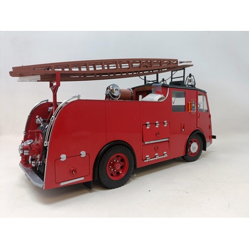 430 - A Corgis Heroes Under Fire two piece fire truck set, No US99150, and assorted other die-cast fire tr... 