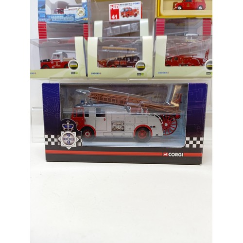 434 - A Dinky ERF Fire tender, No 266, and other toy fire engines and trucks, mostly boxed (box)