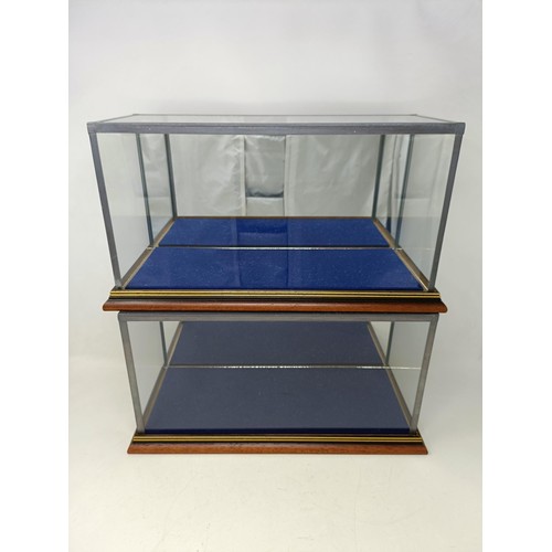 435 - Three mahogany wall hanging toy display cabinets, 58 cm wide, two others, and three table top displa... 