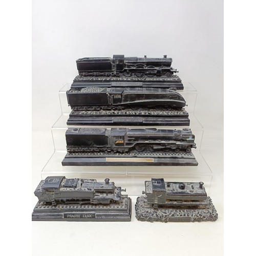 438 - Assorted toy buses, trams, and five carved coal trains (4 boxes)