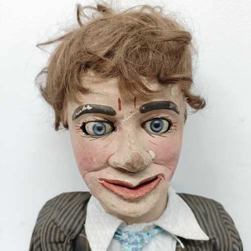 454 - A male ventriloquist dummy, with glass eyes and moving mouth, 88 cm high