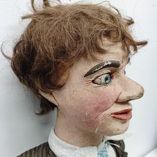 454 - A male ventriloquist dummy, with glass eyes and moving mouth, 88 cm high