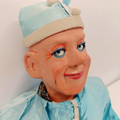 462 - A male clown ventriloquist dummy, with moving bright blue glass eyes and mouth, 87 cm high