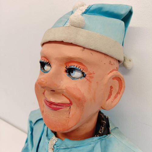 462 - A male clown ventriloquist dummy, with moving bright blue glass eyes and mouth, 87 cm high