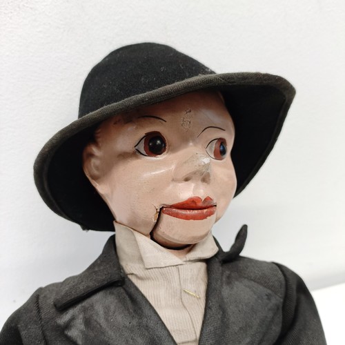 464 - A Charlie McCarthy ventriloquist dummy, with hat, 52 cm high