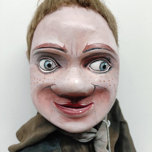 465 - A male ventriloquist dummy, with a restored face, the mouth does not open, with an original photogra... 