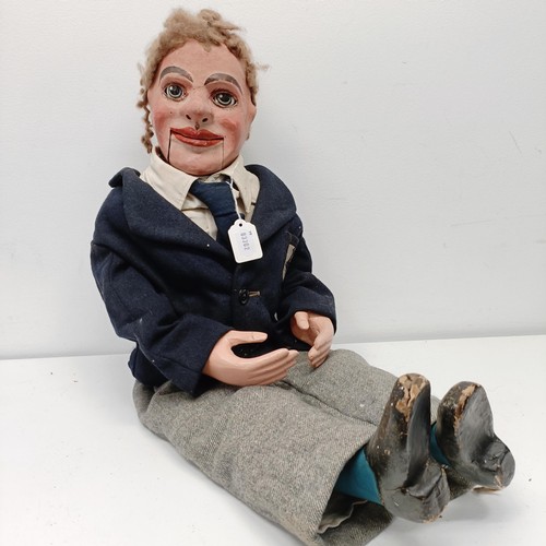 467 - A male ventriloquist dummy, with moving flap of hair, moving mouth, and moving painted wooden eyes, ... 