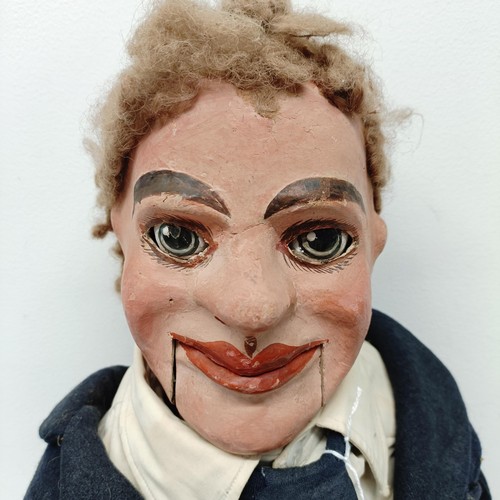 467 - A male ventriloquist dummy, with moving flap of hair, moving mouth, and moving painted wooden eyes, ... 