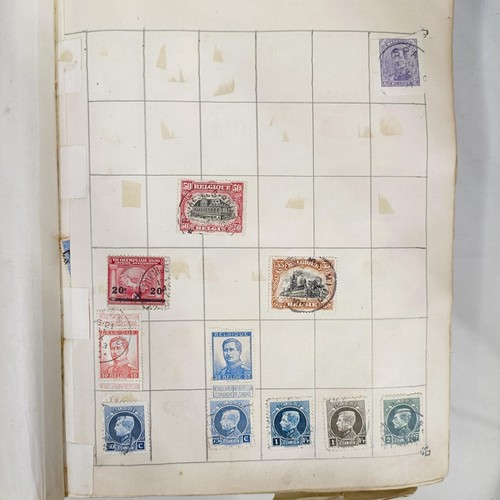 31 - A Strand Postage Stamp album, of assorted world stamps, binding poor/loose