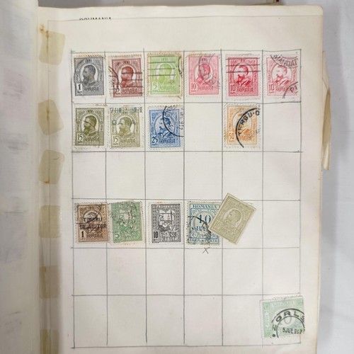 31 - A Strand Postage Stamp album, of assorted world stamps, binding poor/loose