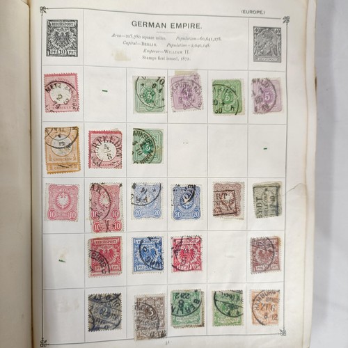 31 - A Strand Postage Stamp album, of assorted world stamps, binding poor/loose