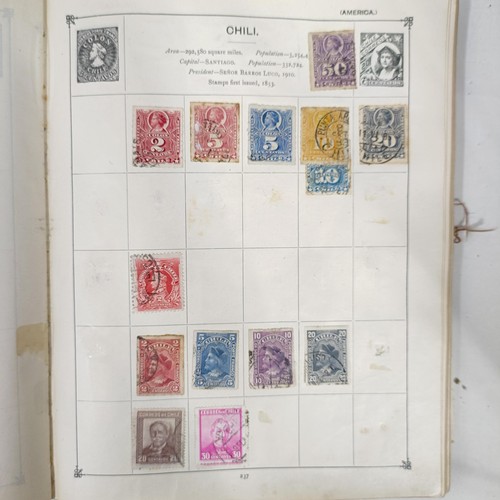 31 - A Strand Postage Stamp album, of assorted world stamps, binding poor/loose