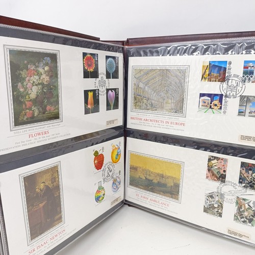 55 - Two albums of silk issue first day covers, no 101-109, London 2012 Olympic Gold Medal Winners first ... 