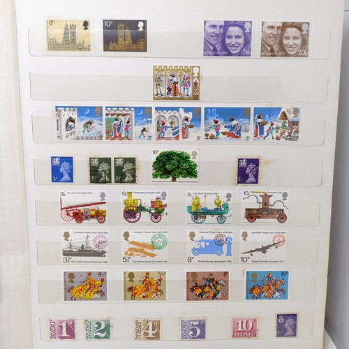 61 - A collection of GB stamps, including a few QVR, but mostly modern commemoratives/presentation packs,... 