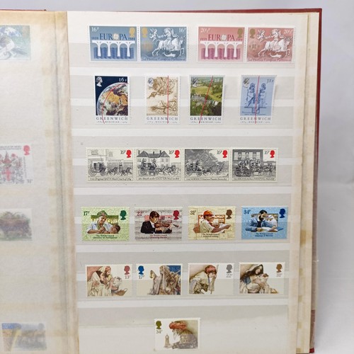 61 - A collection of GB stamps, including a few QVR, but mostly modern commemoratives/presentation packs,... 