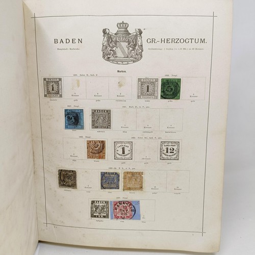 1 - A Schaubek postage stamp album, with assorted world stamps, including a GB Penny Black, 1894 edition