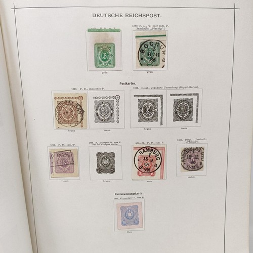 1 - A Schaubek postage stamp album, with assorted world stamps, including a GB Penny Black, 1894 edition