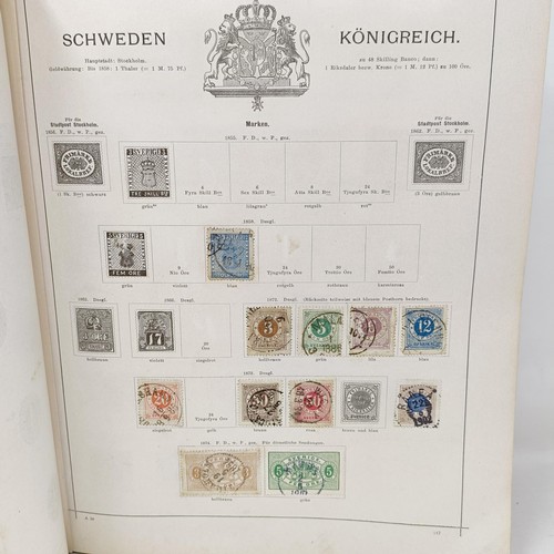 1 - A Schaubek postage stamp album, with assorted world stamps, including a GB Penny Black, 1894 edition