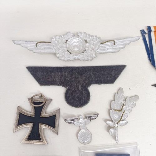 230 - A group of assorted German items, including medals and other items