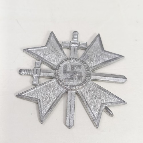 230 - A group of assorted German items, including medals and other items